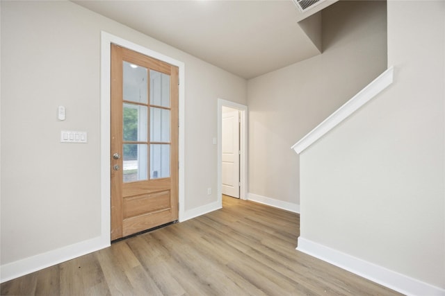 222 Canino Rd A/B, Unit A/B Houston, TX 77076 - foyer featuring baseboards and wood finished floors