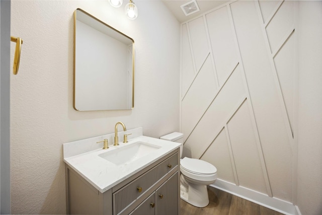 222 Canino Rd A/B, Unit A/B Houston, TX 77076 - half bath with wood finished floors, vanity, and toilet