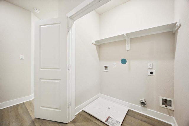 222 Canino Rd A/B, Unit A/B Houston, TX 77076 - laundry room with gas dryer hookup, electric dryer hookup, washer hookup, and wood finished floors