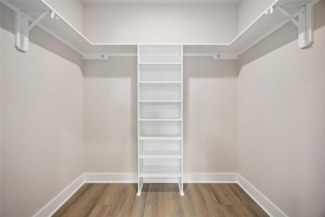 222 Canino Rd A/B, Unit A/B Houston, TX 77076 - walk in closet featuring wood finished floors