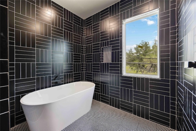 222 Canino Rd A/B, Unit A/B Houston, TX 77076 - bathroom with a freestanding bath and tile walls
