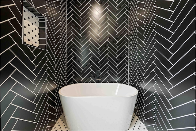 222 Canino Rd A/B, Unit A/B Houston, TX 77076 - bathroom with tile walls and a freestanding bath
