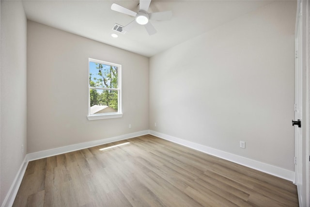 222 Canino Rd A/B, Unit A/B Houston, TX 77076 - spare room featuring wood finished floors, baseboards, and a ceiling fan