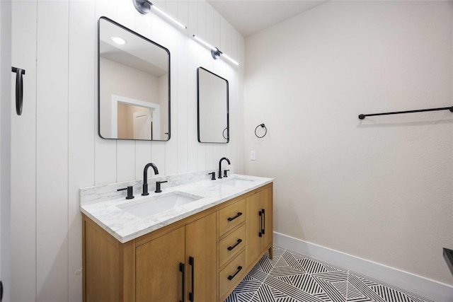 222 Canino Rd A/B, Unit A/B Houston, TX 77076 - bathroom featuring double vanity and baseboards