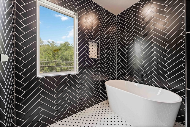 222 Canino Rd A/B, Unit A/B Houston, TX 77076 - bathroom featuring a freestanding bath and tile walls