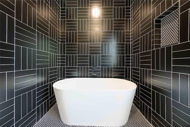 222 Canino Rd A/B, Unit A/B Houston, TX 77076 - bathroom with a freestanding bath, tile walls, and tile patterned flooring