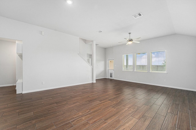 7714 Squall Ln, Baytown, TX 77523 - unfurnished living room with dark wood-style floors, a ceiling fan, baseboards, and lofted ceiling