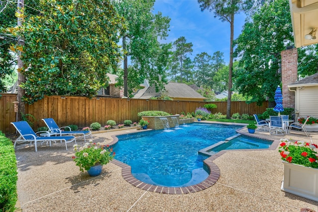 5211 Rothchilde Ct, Houston, TX 77069 - view of swimming pool with a patio area, a pool with connected hot tub, and a fenced backyard