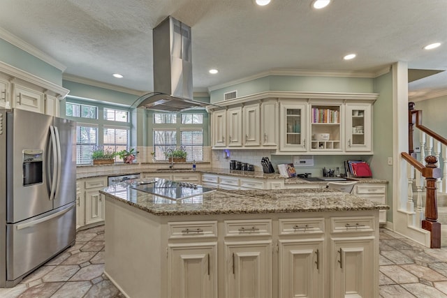 5211 Rothchilde Ct, Houston, TX 77069 - kitchen featuring appliances with stainless steel finishes, island range hood, cream cabinetry, a sink, and recessed lighting