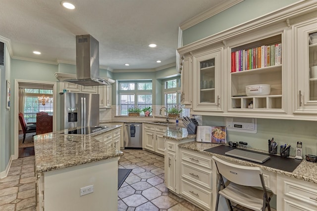 5211 Rothchilde Ct, Houston, TX 77069 - kitchen featuring island exhaust hood, stainless steel appliances, a sink, a kitchen island, and ornamental molding
