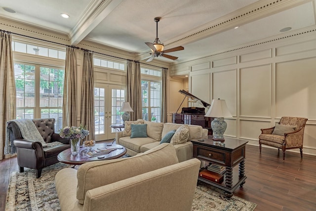 5211 Rothchilde Ct, Houston, TX 77069 - living area featuring a decorative wall, dark wood finished floors, plenty of natural light, ornamental molding, and a ceiling fan