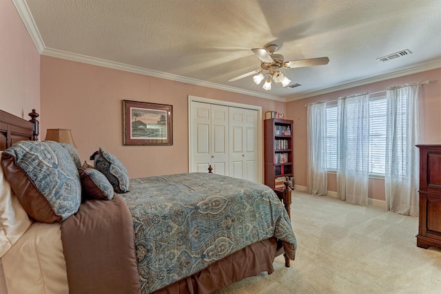 5211 Rothchilde Ct, Houston, TX 77069 - bedroom with light carpet, ornamental molding, a closet, ceiling fan, and baseboards