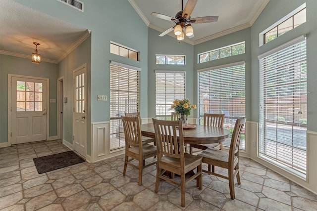 5211 Rothchilde Ct, Houston, TX 77069 - dining area with crown molding and a ceiling fan
