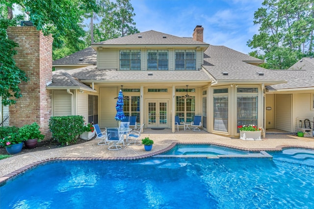 5211 Rothchilde Ct, Houston, TX 77069 - view of pool featuring french doors, a patio area, and a pool with connected hot tub