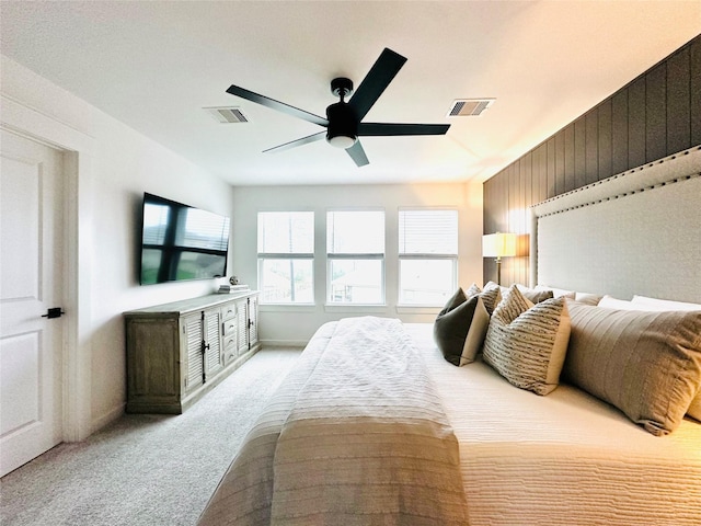12531 Hilltop Mill Rd, Magnolia, TX 77354 - bedroom with light carpet, a ceiling fan, and baseboards