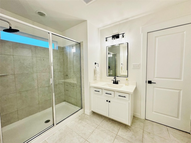 12531 Hilltop Mill Rd, Magnolia, TX 77354 - bathroom featuring a shower stall, tile patterned floors, vanity, and baseboards