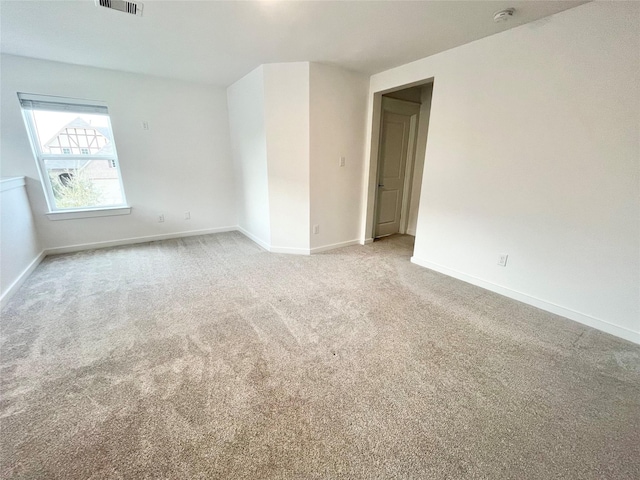 12531 Hilltop Mill Rd, Magnolia, TX 77354 - carpeted empty room featuring baseboards and a smoke detector