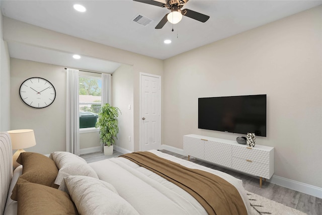 9409 Fairland Dr, Houston, TX 77051 - bedroom featuring wood finished floors, baseboards, recessed lighting, and ceiling fan