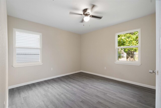 9409 Fairland Dr, Houston, TX 77051 - unfurnished room with wood finished floors, ceiling fan, and baseboards