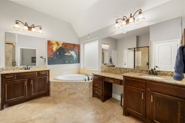 13909 Morgan Bay Dr, Pearland, TX 77584 - bathroom with a stall shower, a bath, lofted ceiling, and two vanities