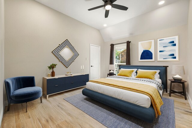 13909 Morgan Bay Dr, Pearland, TX 77584 - bedroom with lofted ceiling, light wood finished floors, recessed lighting, a ceiling fan, and baseboards