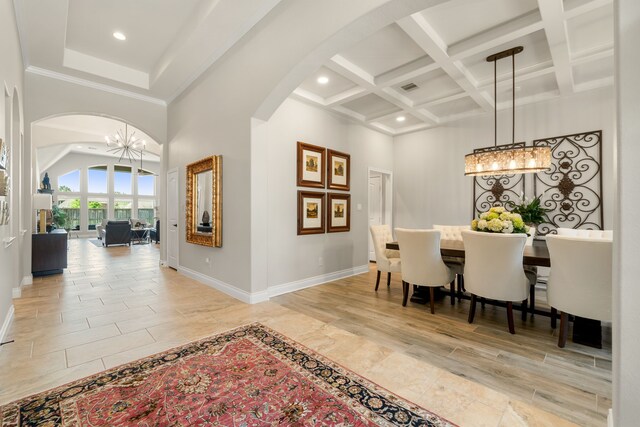 13909 Morgan Bay Dr, Pearland, TX 77584 - dining room with a chandelier, arched walkways, baseboards, beam ceiling, and recessed lighting