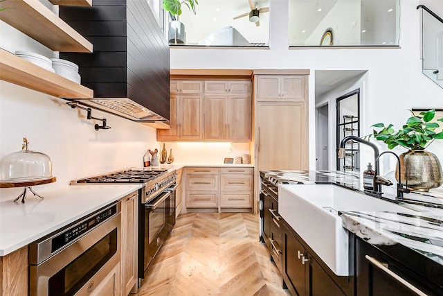 1030 Voight St, Houston, TX 77009 - kitchen featuring appliances with stainless steel finishes, light brown cabinets, light countertops, a sink, and open shelves