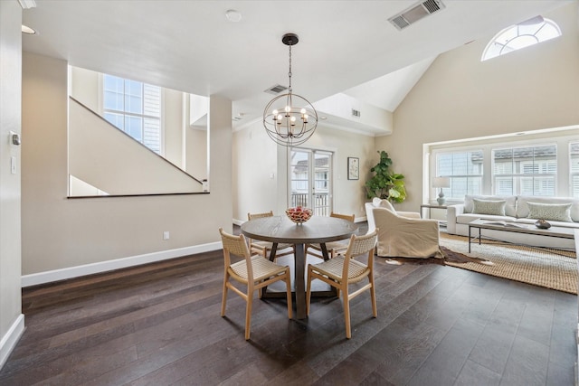 2409 Ralph St Unit A, Houston, TX 77006 - dining space with a chandelier, healthy amount of natural light, baseboards, and high vaulted ceiling