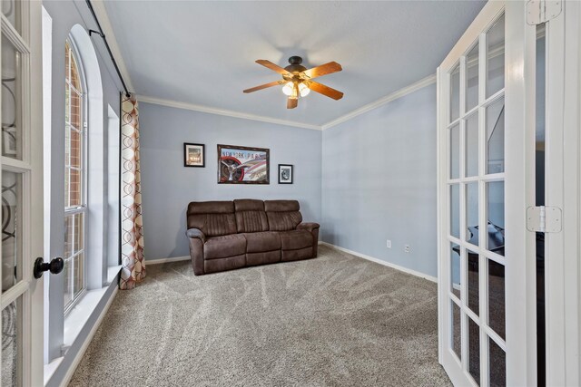 4019 Bellinger Way, Missouri City, TX 77459 - sitting room featuring french doors, ornamental molding, a ceiling fan, carpet floors, and baseboards