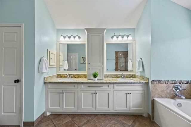 4019 Bellinger Way, Missouri City, TX 77459 - full bathroom with a bath, double vanity, and a tile shower