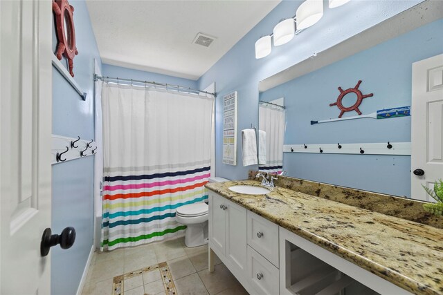 4019 Bellinger Way, Missouri City, TX 77459 - bathroom featuring vanity, toilet, tile patterned floors, and curtained shower