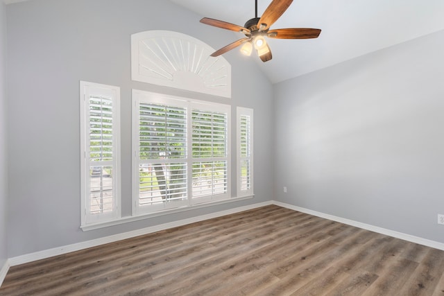 13207 Regency Oak Ln, Cypress, TX 77429 - empty room with vaulted ceiling, wood finished floors, baseboards, and a ceiling fan