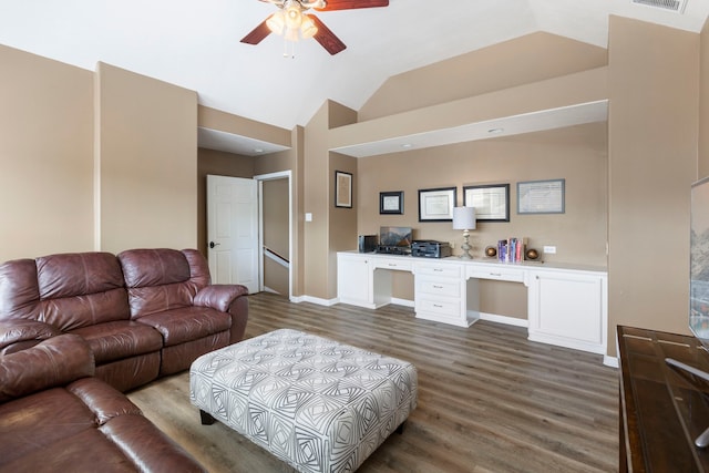 13207 Regency Oak Ln, Cypress, TX 77429 - living area with wood finished floors, a ceiling fan, vaulted ceiling, and baseboards