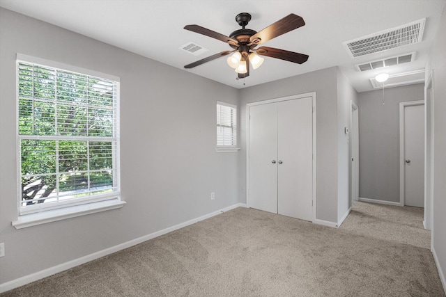 8111 Sanders Forest Ct, Humble, TX 77338 - unfurnished bedroom featuring attic access, carpet floors, baseboards, and a closet