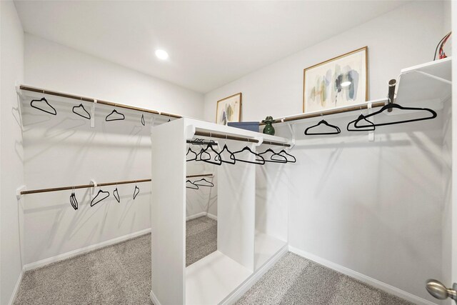 701 Barton Place Dr, Cleveland, TX 77327 - spacious closet featuring carpet flooring