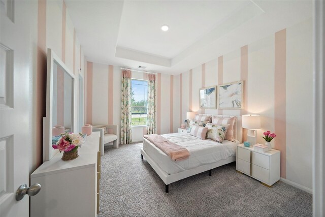 701 Barton Place Dr, Cleveland, TX 77327 - bedroom with carpet flooring, wallpapered walls, and a raised ceiling