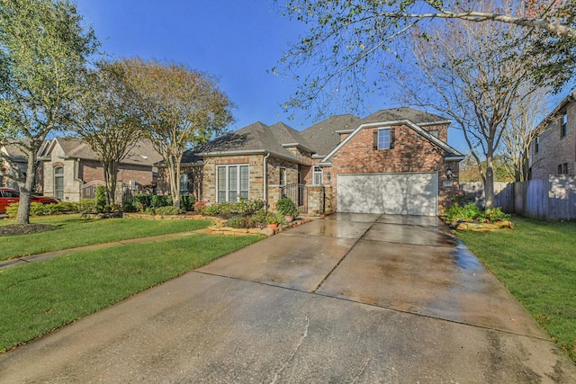 18618 Arlan Lake Dr, Spring, TX 77388 - traditional-style house with brick siding, concrete driveway, and a garage