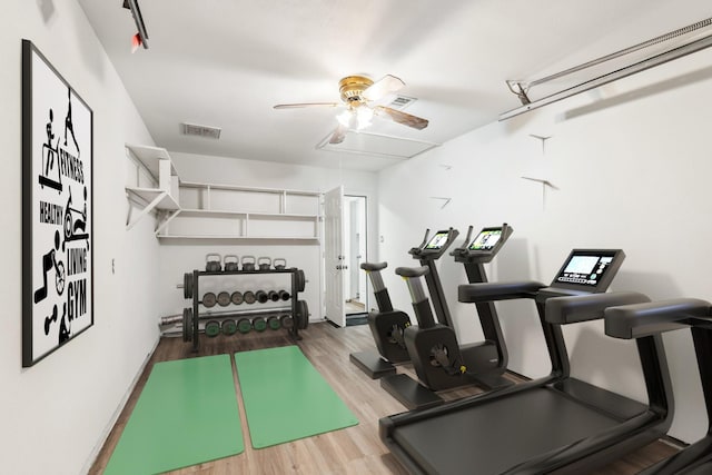 6038 Woodbrook Ln, Houston, TX 77008 - workout area with attic access, wood finished floors, and ceiling fan