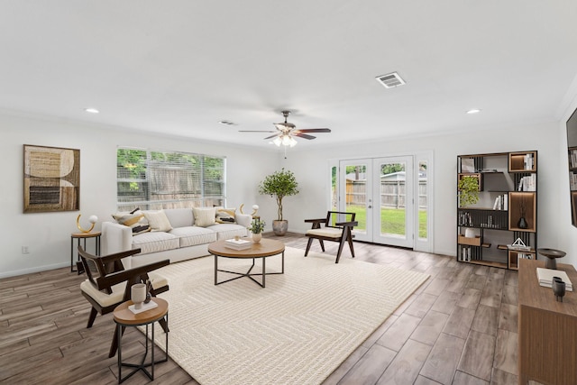 6038 Woodbrook Ln, Houston, TX 77008 - living room featuring healthy amount of natural light, ceiling fan, baseboards, wood finished floors, and recessed lighting