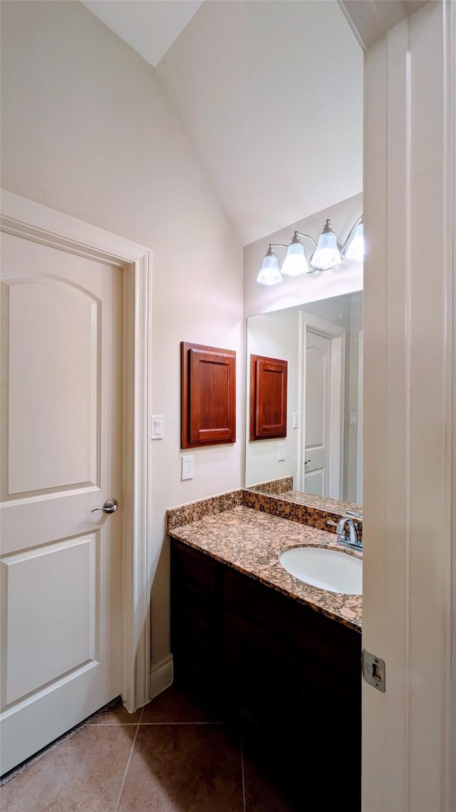 2530 Sparrow Crest Dr, Katy, TX 77494 - bathroom featuring vaulted ceiling, tile patterned flooring, and vanity
