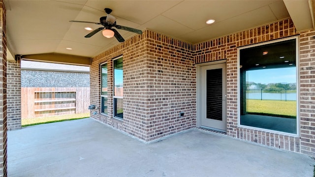 2530 Sparrow Crest Dr, Katy, TX 77494 - view of patio / terrace with a ceiling fan and a water view