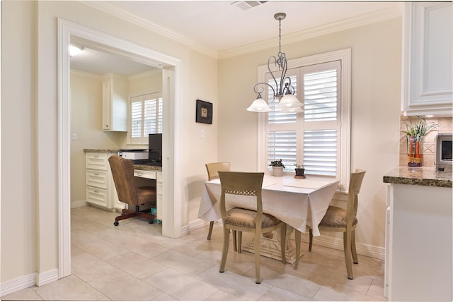6235 Queenswood Ln, Houston, TX 77008 - dining area with a chandelier, ornamental molding, an office area, baseboards, and light tile patterned floors
