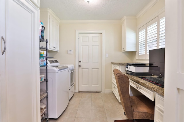 6235 Queenswood Ln, Houston, TX 77008 - washroom featuring cabinet space, washer and clothes dryer, crown molding, a textured ceiling, and a desk