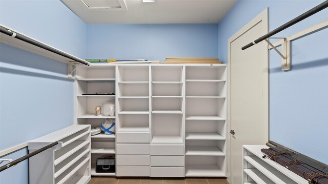 2323 Polk St Unit 302, Houston, TX 77003 - spacious closet with tile patterned floors