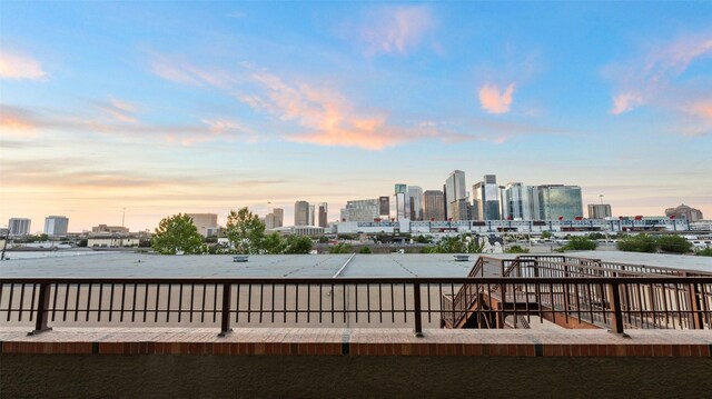 2323 Polk St Unit 302, Houston, TX 77003 - exterior space featuring a view of skyline and a water view
