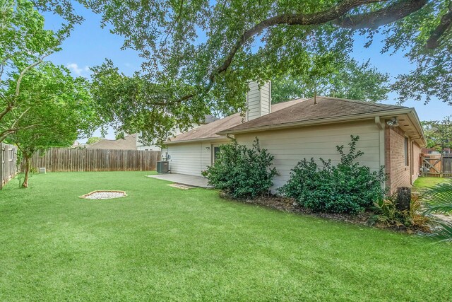 31115 Perlican Dr, Spring, TX 77386 - view of yard featuring a patio area and cooling unit