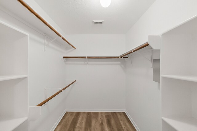 31115 Perlican Dr, Spring, TX 77386 - spacious closet featuring wood finished floors