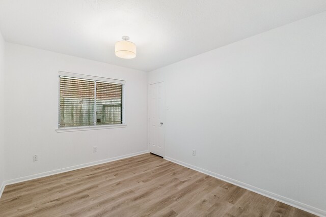 31115 Perlican Dr, Spring, TX 77386 - unfurnished room featuring light wood finished floors and baseboards