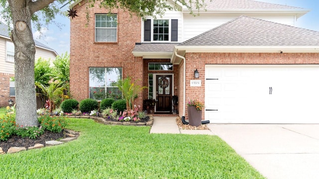 13703 View Meadow Ln, Houston, TX 77034 - traditional home featuring brick siding, roof with shingles, a front lawn, an attached garage, and driveway