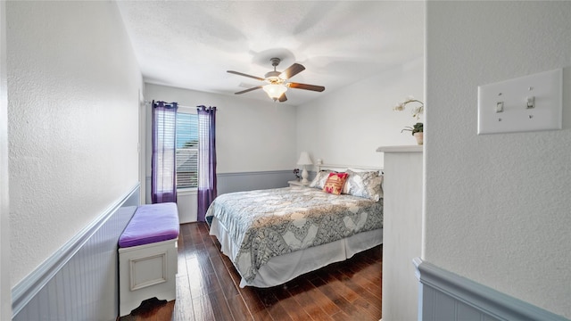 13703 View Meadow Ln, Houston, TX 77034 - bedroom with a textured wall, dark wood-type flooring, and a ceiling fan